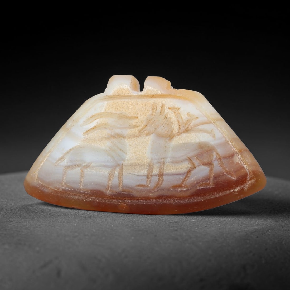 Vintage Natural Carnelian Agate Revival Indo-Persian Glyptic Figural Talisman Amulet Plaque, 93FK: This vintage talisman pendant plaque is skillfully carved from natural banded carnelian agate, crafted in a style referencing ancient Indo-Persian glyptic art traditions. The face bears detailed relie