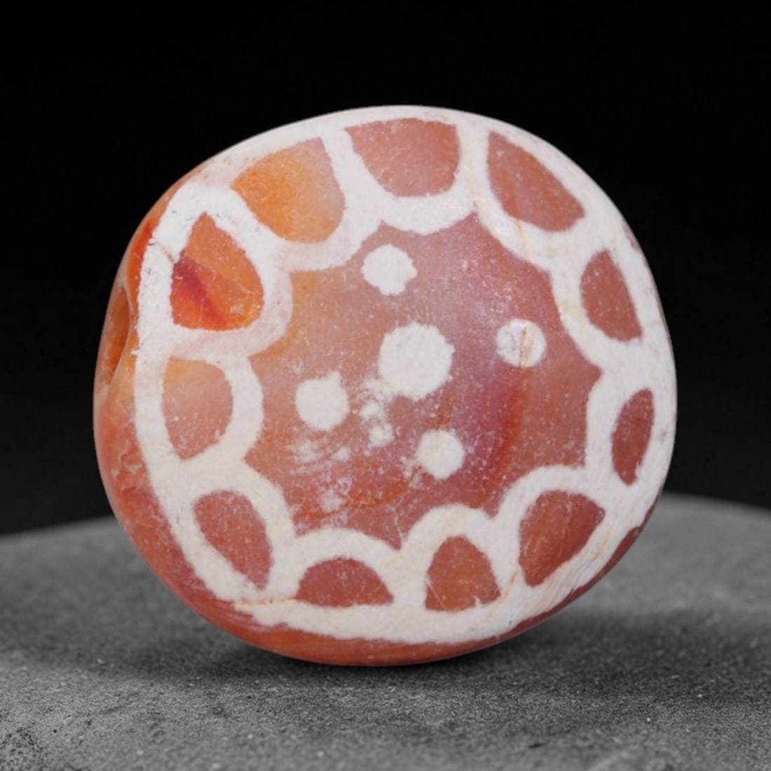 Antique Sino-Himalayan Region Etched Carnelian Bead, 11EH: Antique etched carnelian bead originating from the Sino-Himalayan region. Exhibits characteristic surface patina and traditional etched white decoration. Dimensions: 12x12mm, fully pierced for suspens