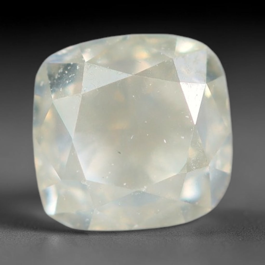 0.49ct Untreated Natural Fancy Diamond Loose Gemstone, 100BH: This fully polished untreated natural fancy diamond features inherent internal mineral markings characteristic of natural diamond formation, measured at calibrated dimensions of 4x3.8x3.3mm. Precision