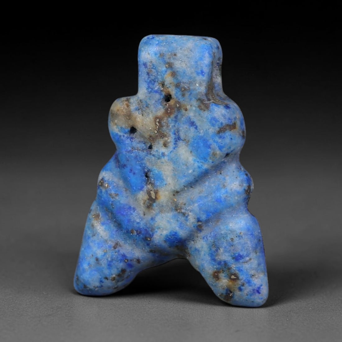 Ancient Medieval Coptic Egyptian Lapis Lazuli Amulet (400-800 CE), 50EG: This antique lapis lazuli amulet originates from Ancient Medieval Coptic Egyptian cultural tradition, created to function as a wearable protective talisman for personal spiritual safeguard. The deepbl