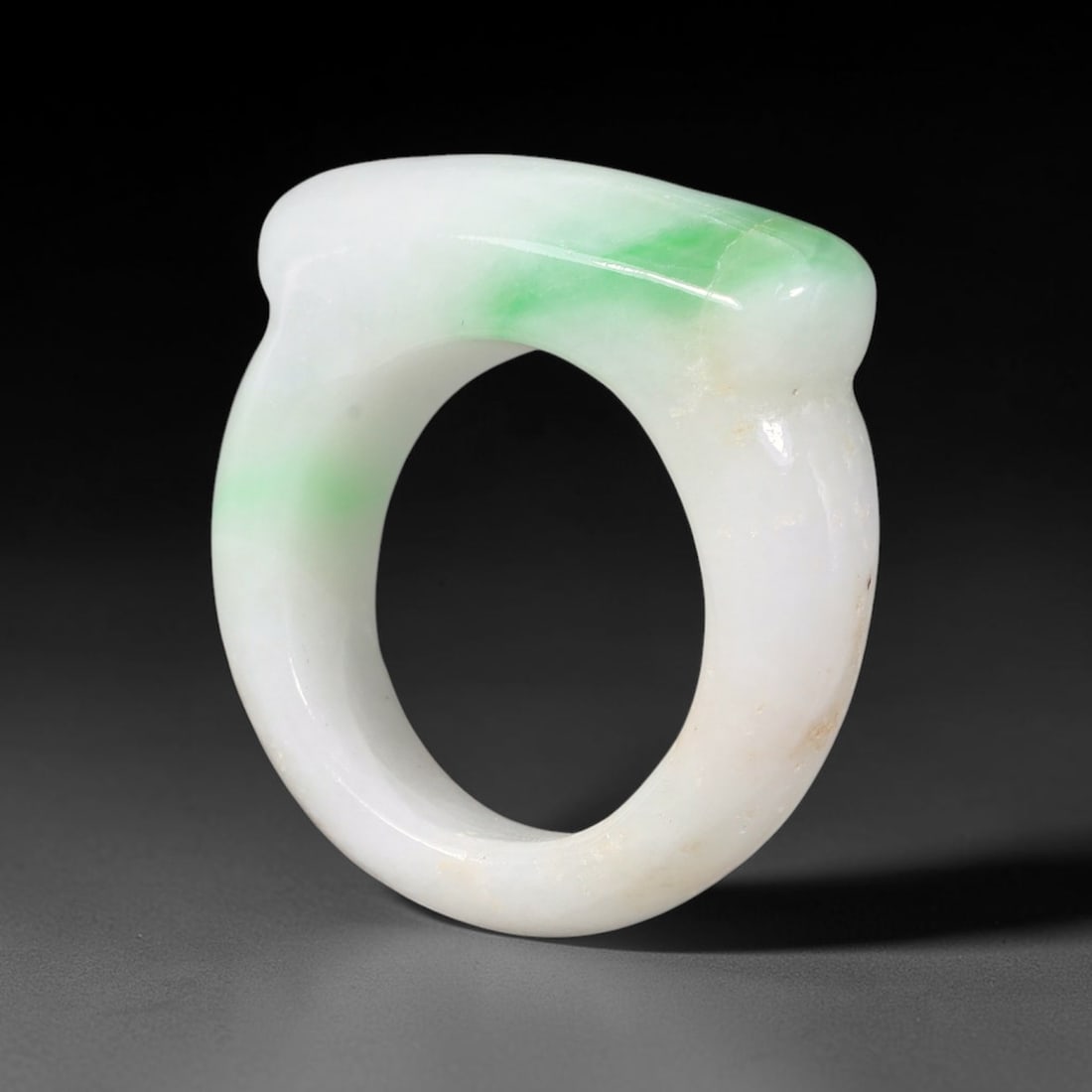 Natural Burmese Type A Jadeite Jade Moss-in-Snow Saddle Ring, 1BK: Hand-polished untreated Burmese Type A jadeite jade saddle ring, US ring size 8 with a band width of 9 mm. Showcases classic moss-in-snow patterning: bright apple green flecks naturally scattered acro