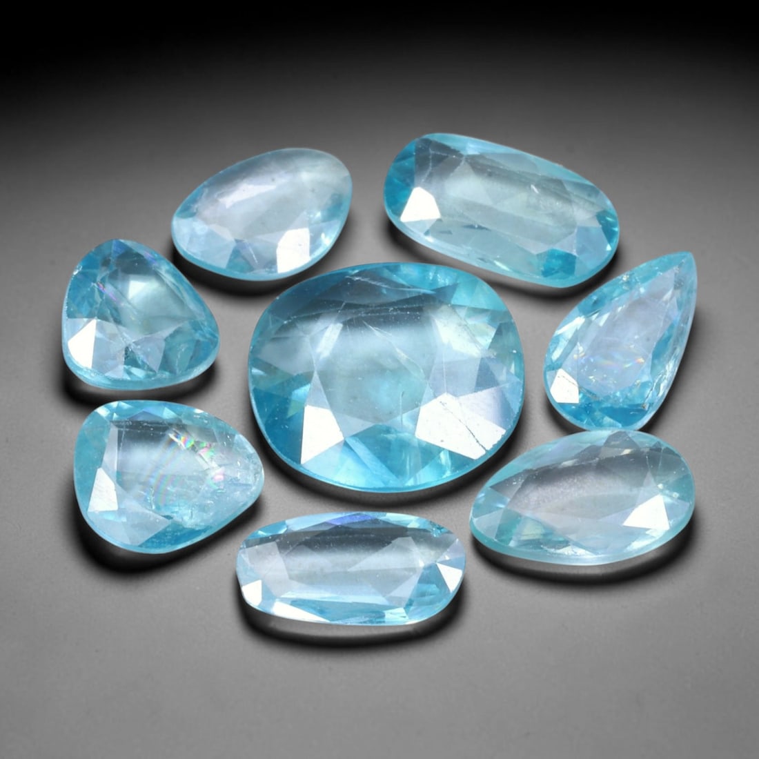 16.97ct Natural Cambodian Rose Cut Blue Zircon Loose Gemstone Parcel Lot, 13EV: This attractive parcel of rose-cut blue zircon features cool aquatic blue tones paired with flat-backed rose cut faceting, creating soft diffused sparkle and dreamy translucent visual effect. Varied f