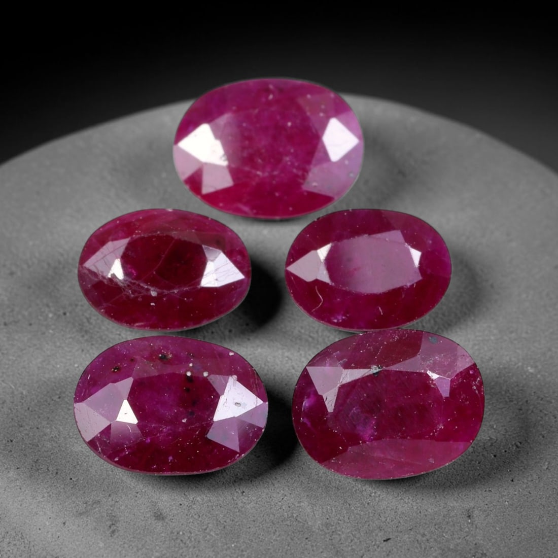 6.04ct Natural Tanzanian Longido Ruby Loose Gemstone Parcel Lot, 21EV: This fine parcel of Longido rubies features deep rich crimson-red colour across uniform oval faceted cuts. Natural internal textures lend authentic character to each stone, while well-formed facets ca