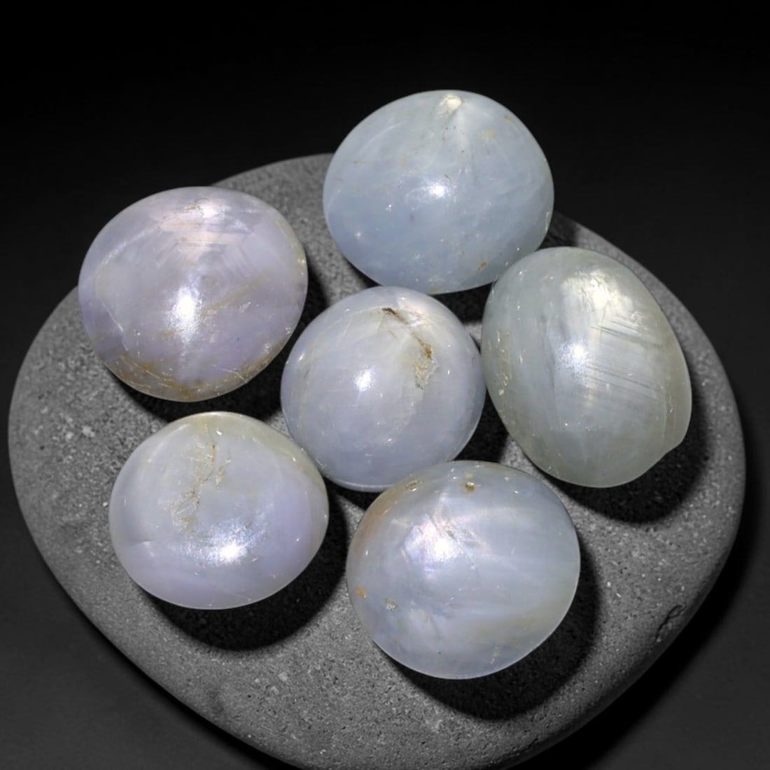 10.21ct Natural Unheated Burmese Star Sapphire Loose Gemstone Parcel, 96FL: This parcel contains natural unheated star sapphire originating from Myanmar. The gem material displays soft pale blue and lavender hues, with characteristic silk inclusions that create the desirable 