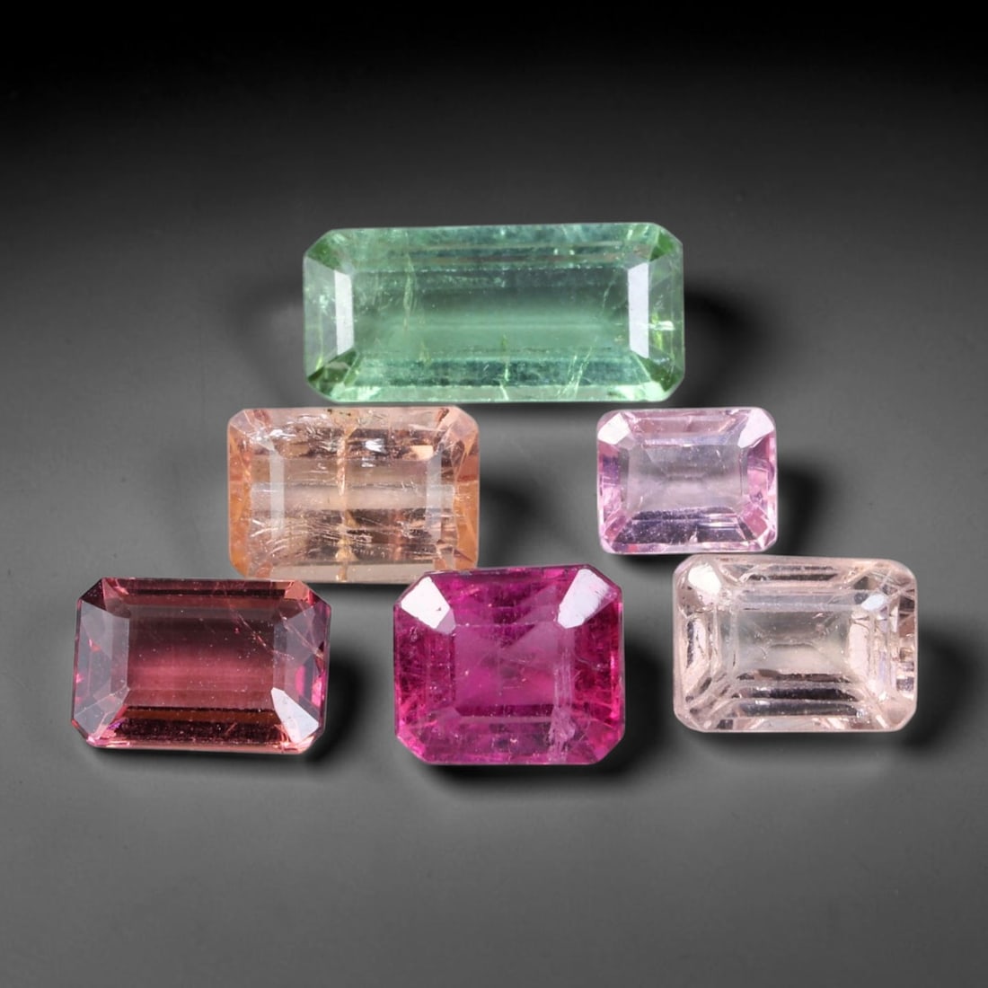 7.96ct Natural Mozambican Fancy Tourmaline Loose Gemstone Parcel Lot, 7EW: This colourful parcel of fancy tourmaline presents a vibrant spectrum of tones, including pastel mint-green, deep teal-blue, soft rose-pink and striking bi-colour saturation across mixed emerald-cut a