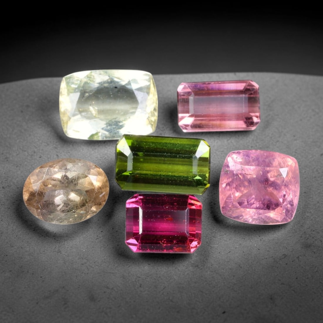 7.56ct Natural Mozambican Fancy Tourmaline Loose Gemstone Parcel Lot, 13EW: This colourful parcel of fancy tourmaline presents a vibrant spectrum of tones, including pastel mint-green, deep teal-blue, soft rose-pink and striking bi-colour saturation across mixed emerald-cut a