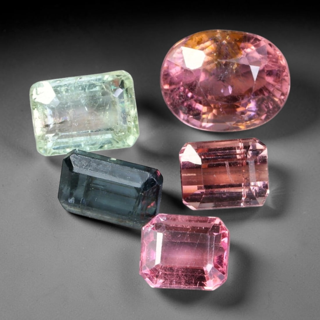 7.15ct Natural Mozambican Fancy Tourmaline Loose Gemstone Parcel Lot, 8EW: This colourful parcel of fancy tourmaline presents a vibrant spectrum of tones, including pastel mint-green, deep teal-blue, soft rose-pink and striking bi-colour saturation across mixed emerald-cut a