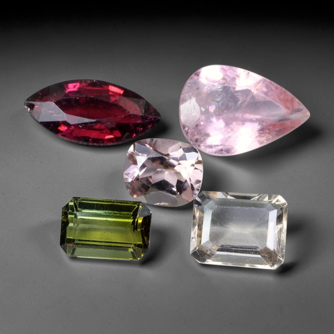 7.91ct Natural Mozambican Fancy Tourmaline Loose Gemstone Parcel Lot, 15EW: This colourful parcel of fancy tourmaline presents a vibrant spectrum of tones, including pastel mint-green, deep teal-blue, soft rose-pink and striking bi-colour saturation across mixed emerald-cut a