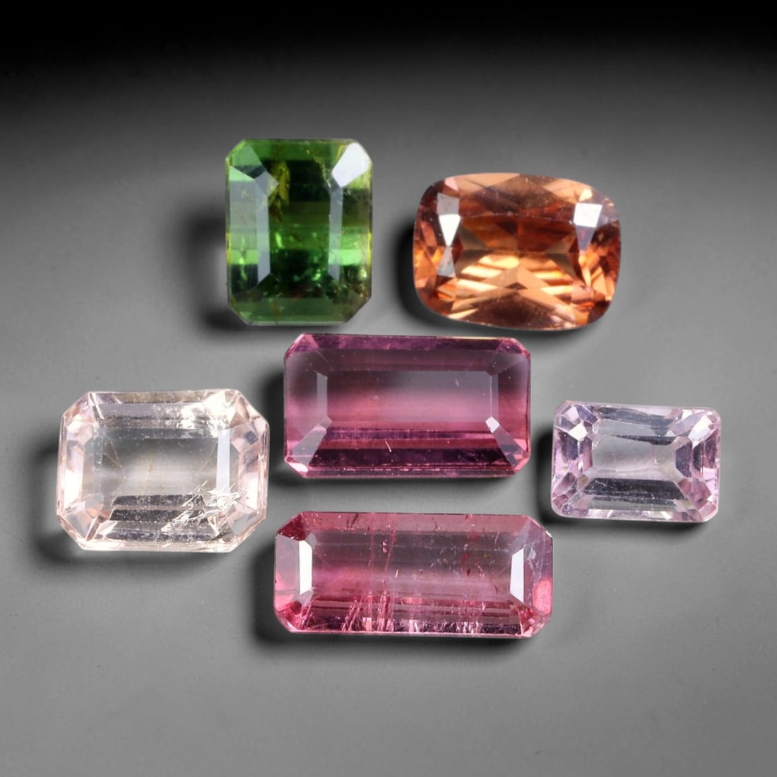 7.42ct Natural Mozambican Fancy Tourmaline Loose Gemstone Parcel Lot, 12EW: This colourful parcel of fancy tourmaline presents a vibrant spectrum of tones, including pastel mint-green, deep teal-blue, soft rose-pink and striking bi-colour saturation across mixed emerald-cut a