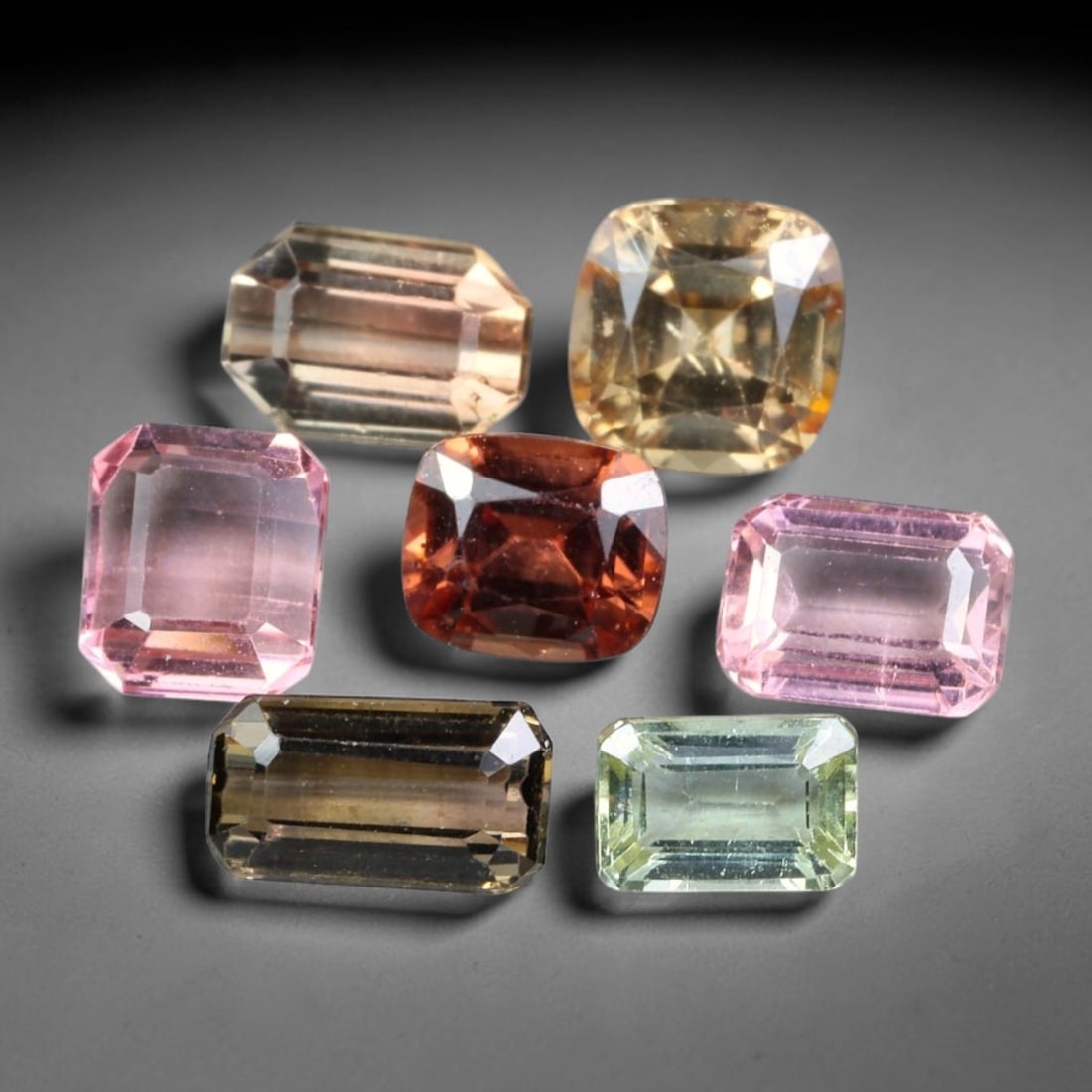 6.79ct Natural Mozambican Fancy Tourmaline Loose Gemstone Parcel Lot, 11EW: This colourful parcel of fancy tourmaline presents a vibrant spectrum of tones, including pastel mint-green, deep teal-blue, soft rose-pink and striking bi-colour saturation across mixed emerald-cut a
