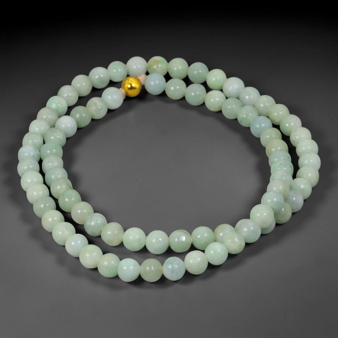 Natural Burmese Type A Jadeite Jade Round Bead Necklace with Gold Gilt Accent Bead, 2BL: Elegant hand-strung necklace made from polished natural untreated Burmese Type A jadeite jade spherical beads, each bead measuring 8 mm in diameter. The jadeite features a soft pale milky celadon hue 