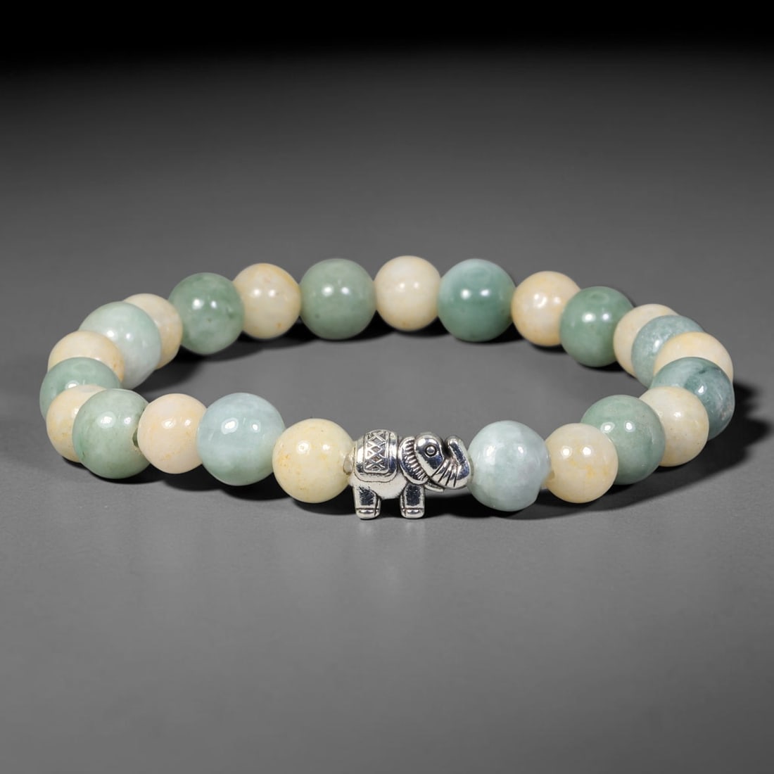 Natural Burmese Type A Jadeite Jade Beaded Bracelet, 27EP: Polished natural jadeite jade round beads complemented by decorative crystal spacer accents. Uniform 8mm beads form a flexible wearable strand. A timeless gemstone bracelet suitable for daily styling,
