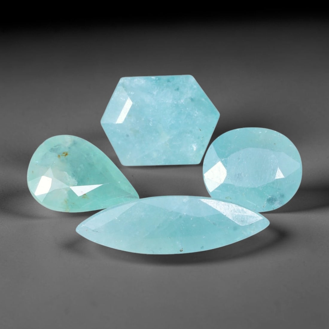 11.88ct Natural Madagascan Aqua Blue Grandidierite Loose Gemstone Parcel Lot, 35EV: This captivating parcel of grandidierite delivers soft aqua blue and subtle teal-green tones, with gentle internal glow that shifts beautifully under changing light conditions. Faceted in mixed oval, 