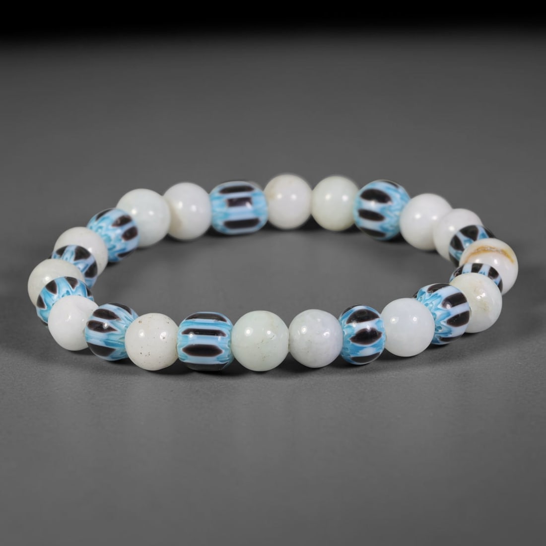 Natural Burmese Type A Jadeite Jade with Chevron Glass Bead Bracelet, 49EK: Bracelet assembled from natural Burmese Type A jadeite jade beads paired with classic chevron-style glass beads. Uniform bead size measures 8.8mm. Smooth polished beads form a cohesive wearable strand