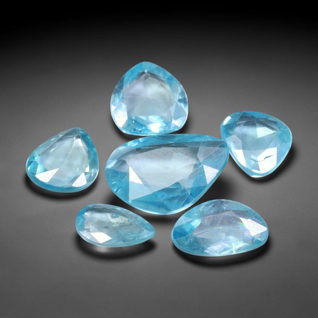 14.16ct Natural Cambodian Rose Cut Blue Zircon Loose Gemstone Parcel Lot, 12EV: This attractive parcel of rose-cut blue zircon features cool aquatic blue tones paired with flat-backed rose cut faceting, creating soft diffused sparkle and dreamy translucent visual effect. Varied f