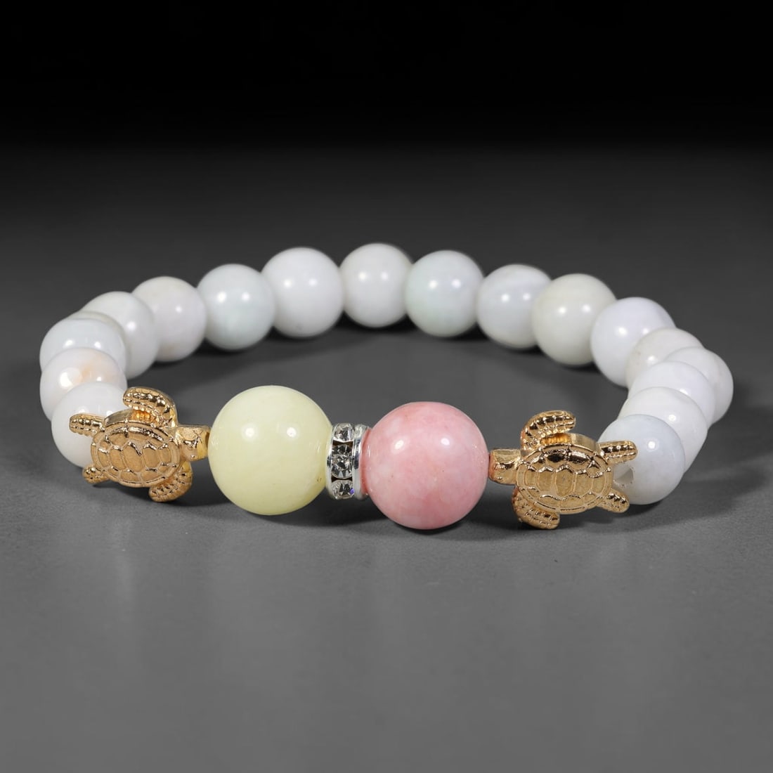 Natural Burmese Type A Jadeite Jade Beaded Bracelet, 6FJ: Made with polished natural jadeite jade round beads featuring soft pale natural tones. Each bead measures 9mm, strung as a flexible stretch bracelet. A minimalist elegant design ideal for daily wear, 