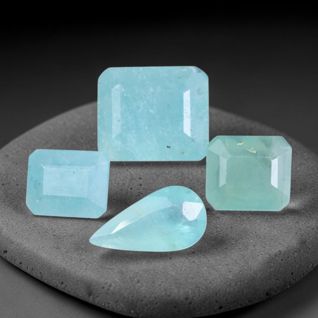 12.45ct Natural Madagascan Aqua Blue Grandidierite Loose Gemstone Parcel Lot, 36EV: This captivating parcel of grandidierite delivers soft aqua blue and subtle teal-green tones, with gentle internal glow that shifts beautifully under changing light conditions. Faceted in mixed oval, 