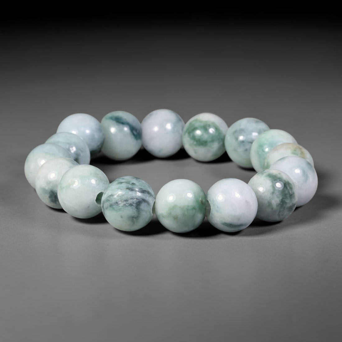 Natural Burmese Type A Jadeite Jade Beaded Bracelet, 21mm Beads, 50BK: Hand-strung bracelet crafted from polished untreated Burmese Type A jadeite jade beads. Every bead features smooth refined polishing with clean centered drill holes for sturdy flexible stringing. Auth
