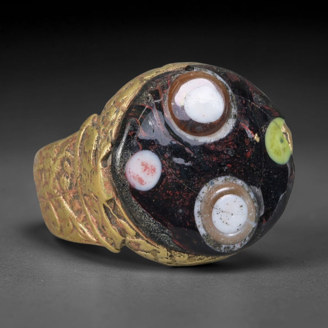 Antique Islamic Millefiori Evil Eye Glass Cabochon Set Vintage Signet Ring (1700-1900 CE), 35AM: The primary collectible value resides within the inset antique millefiori evil-eye glass cabochon, authentic genuine antique glass (distinguished from earlier ancient glass and modern vintage glass) c
