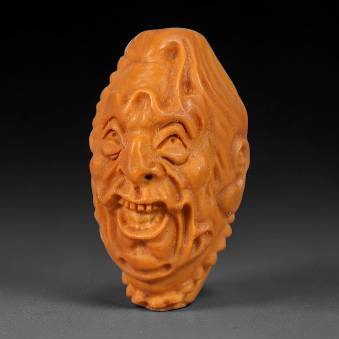 A Chinese Carved Natural Olive Nut Drilled Art Bead, 12BZ: Traditional craft bead carved from solid natural olive nut core, representing a classic miniature Chinese micro-carving folk art piece with a pre-drilled suspension bore integrated for easy threading 
