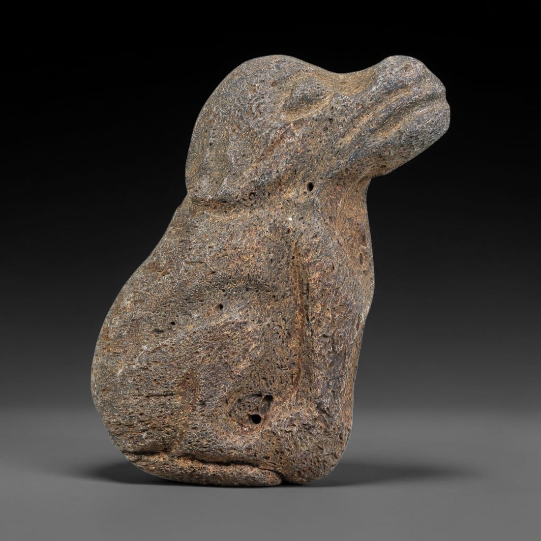 Ancient Near Eastern Stone Zoomorphic Effigy (500BCE-300CE), 63EJ: This antique stone zoomorphic effigy originates from ancient Near Eastern cultural tradition, crafted for ritual and talismanic application. The porous stone exhibits deep burial patina, textured aged