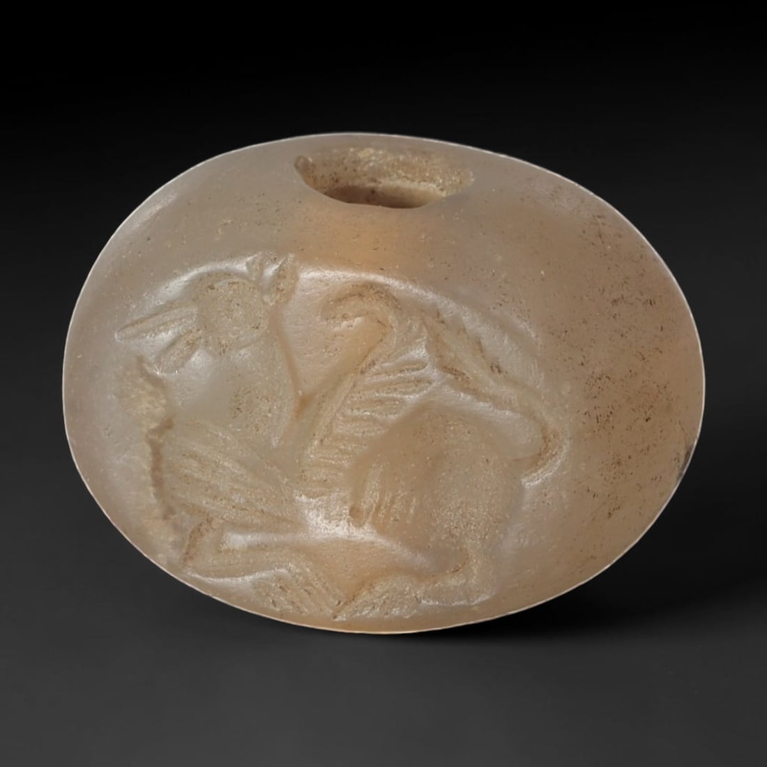 Ancient Sasanian Chalcedony Hemispherical Stamp Seal, 26AP: Authentic antique hemispherical stamp seal carved from natural unmodified chalcedony, dimensions 1.8cm x 1.4cm. This classic Sasanian-era domed stamp seal features the characteristic compact oval hemi