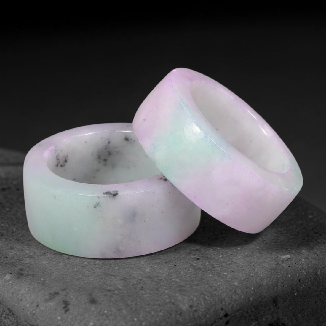 Burmese Type-A Jadeite Jade Thumb Rings Chinese Archer Set, 52EX: Crafted from natural Burmese Type-A jadeite jade, these archer's thumb rings displays mottled green, pale lavender and dark mineral inclusions within the stone. Each ring is formed as a thick cylindri