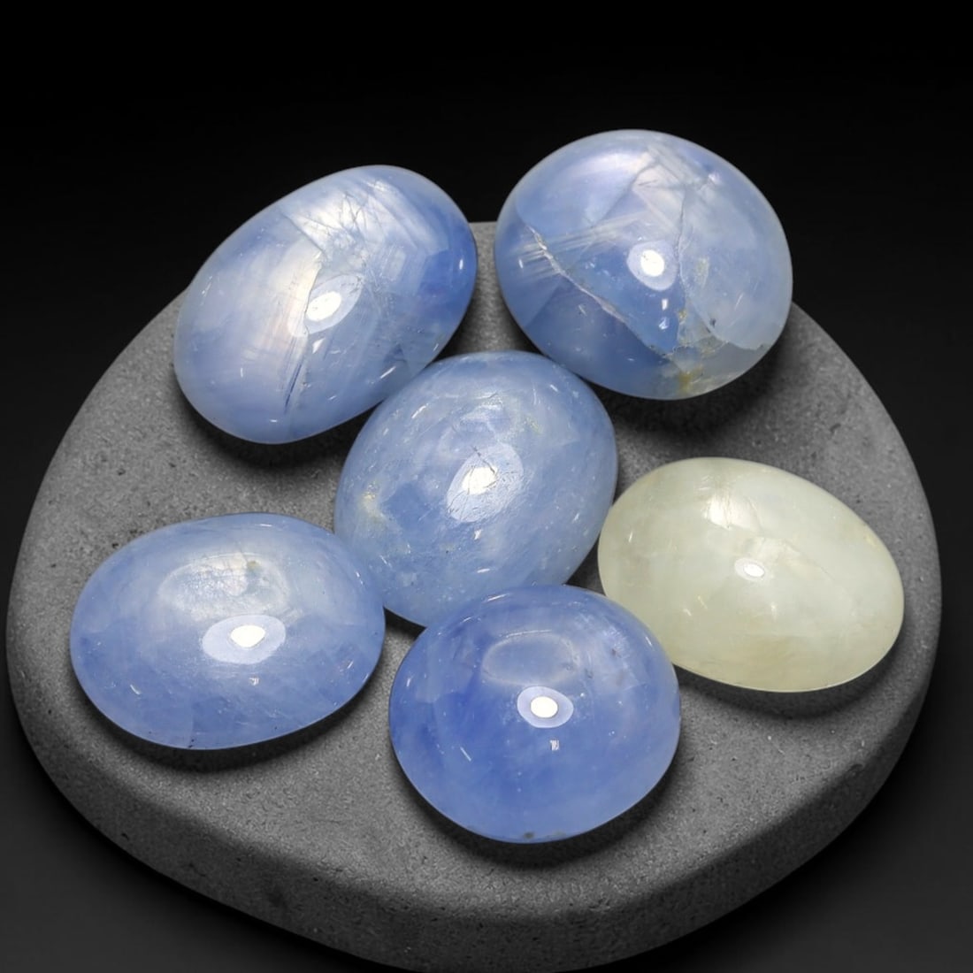 28.11ct Natural Unheated Burmese Star Sapphire Loose Gemstone Parcel Lot, 26EX: This parcel contains natural unheated star sapphire originating from Myanmar. The gem material displays soft pale blue and lavender hues, with characteristic silk inclusions that create the desirable 