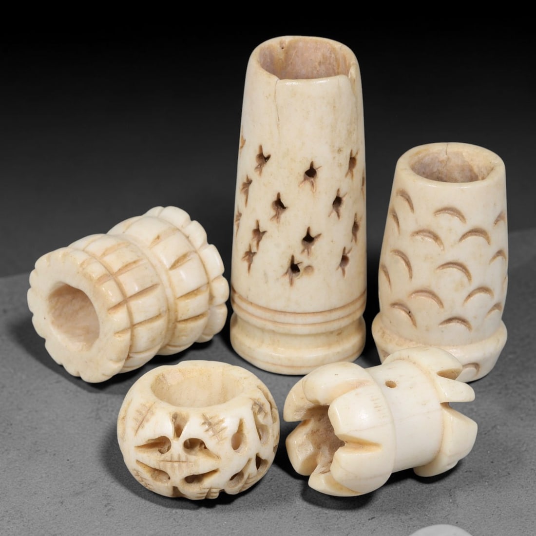 Antique Sino-Siberian Steppe Nomadic Stag Antler Carved Beads Parcel Lot, 29EY: Group of antique post-1850s Sino-Siberian steppe nomadic craft stag antler carved beads, each with fully drilled central bore for threading. Surfaces feature varied incised decorative motifs including