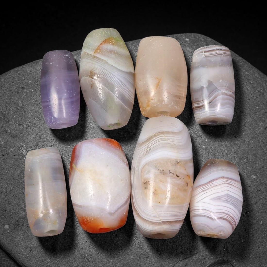 Ancient Himalayan Banded Agate Beads Parcel Lot, 89EY: Assembled parcel of ancient natural banded agate beads showcasing distinctive layered banding patterns across varied translucent and opaque agate bodies. Each bead bears authentic signs of antiquity i