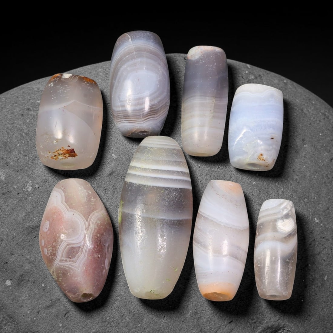 Ancient Himalayan Banded Agate Beads Parcel Lot, 85EY: Assembled parcel of ancient natural banded agate beads showcasing distinctive layered banding patterns across varied translucent and opaque agate bodies. Each bead bears authentic signs of antiquity i