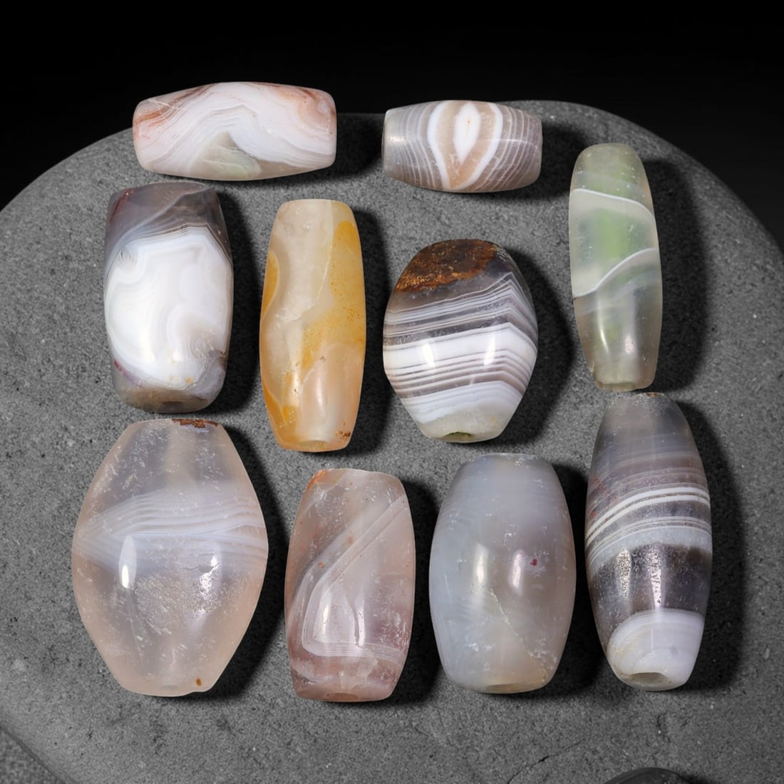 Ancient Himalayan Banded Agate Beads Parcel Lot, 52EY: Assembled parcel of ancient natural banded agate beads showcasing distinctive layered banding patterns across varied translucent and opaque agate bodies. Each bead bears authentic signs of antiquity i