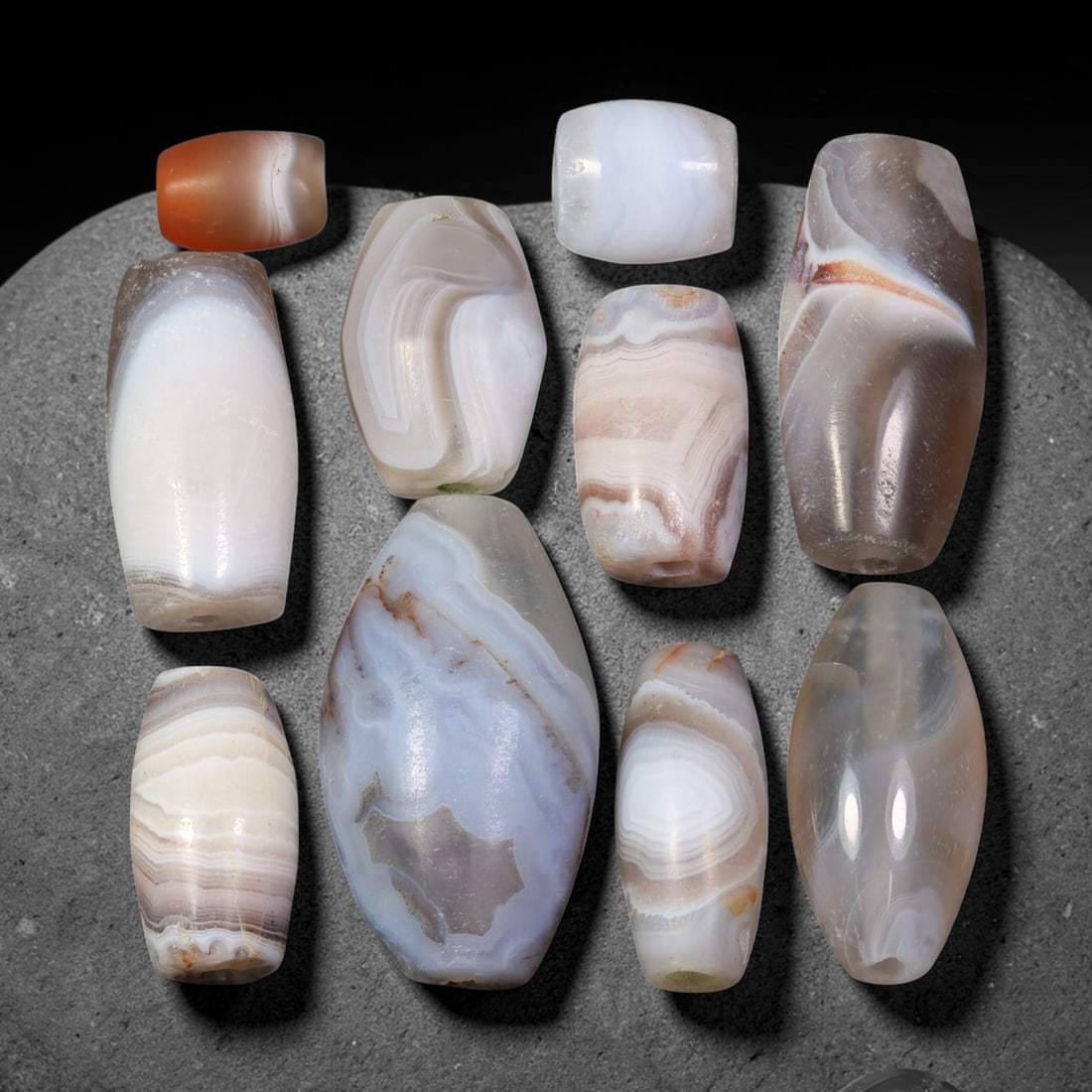 Ancient Himalayan Banded Agate Beads Parcel Lot, 51EY: Assembled parcel of ancient natural banded agate beads showcasing distinctive layered banding patterns across varied translucent and opaque agate bodies. Each bead bears authentic signs of antiquity i