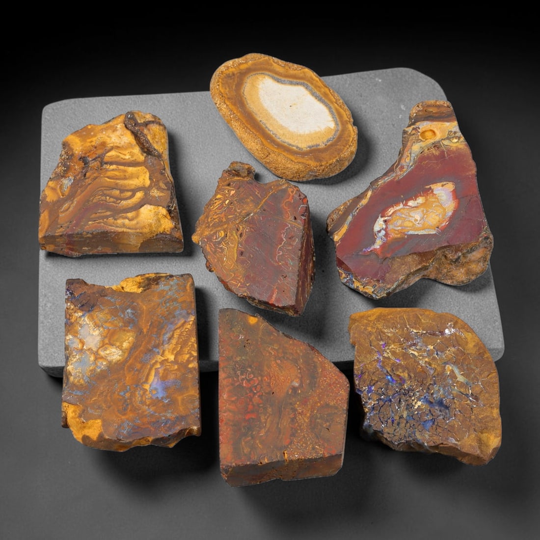410ct Natural Australian Queensland Boulder Opal Sliced Rough Parcel Lot, 59EX: This sliced rough parcel features multiple boulder opal slices displaying striking natural opal colour flashes set within solid ironstone host matrix. The slices exhibit varied patterns including vivi