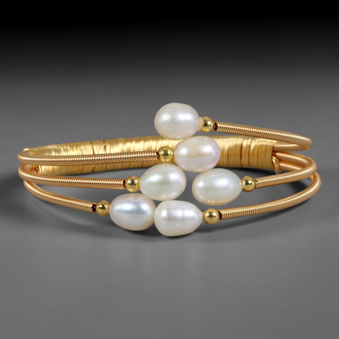 Natural Cultured Freshwater Pearl Gold Plated Wire Wrap Open Cuff Bracelet, 85AC: Handcrafted adjustable open cuff bracelet constructed from polished gold plated metal wire, featuring genuine natural cultured freshwater pearl inlays secured via intricate hand wire-wrapping craft te