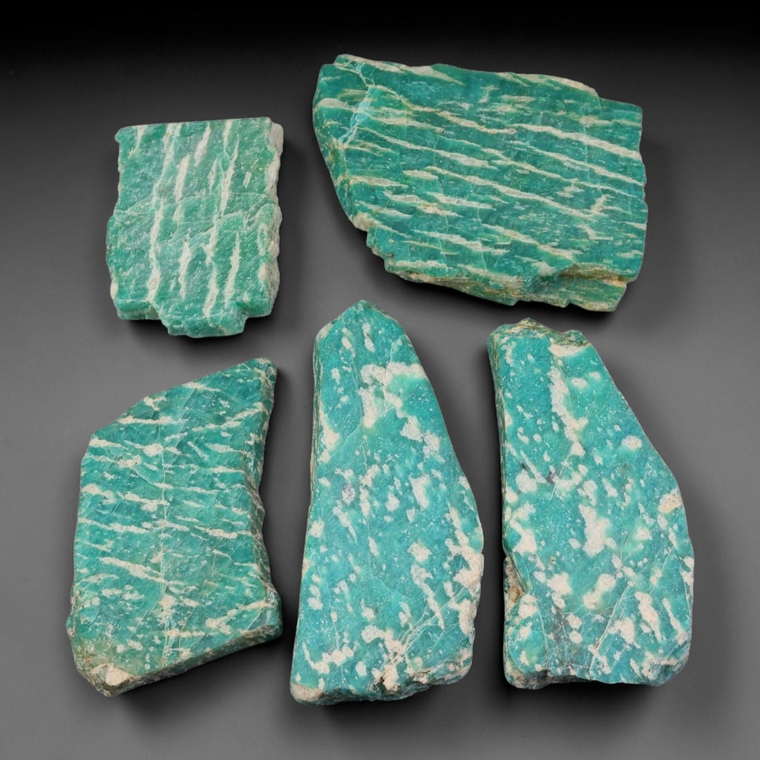 355ct Natural Russian Amazonite Slice Rough Parcel Lot, 72EX: This rough slice parcel displays striking teal-green amazonite interwoven with prominent creamy-white vein patterns across sawn flat surfaces. Each slice shows natural cleaving lines, crystalline text