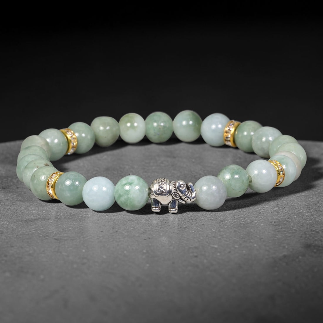 Natural Burmese Type A Jadeite Jade Beaded Bracelet, 32EP: Polished natural jadeite jade round beads complemented by decorative crystal spacer accents. Uniform 8mm beads form a flexible wearable strand. A timeless gemstone bracelet suitable for daily styling,