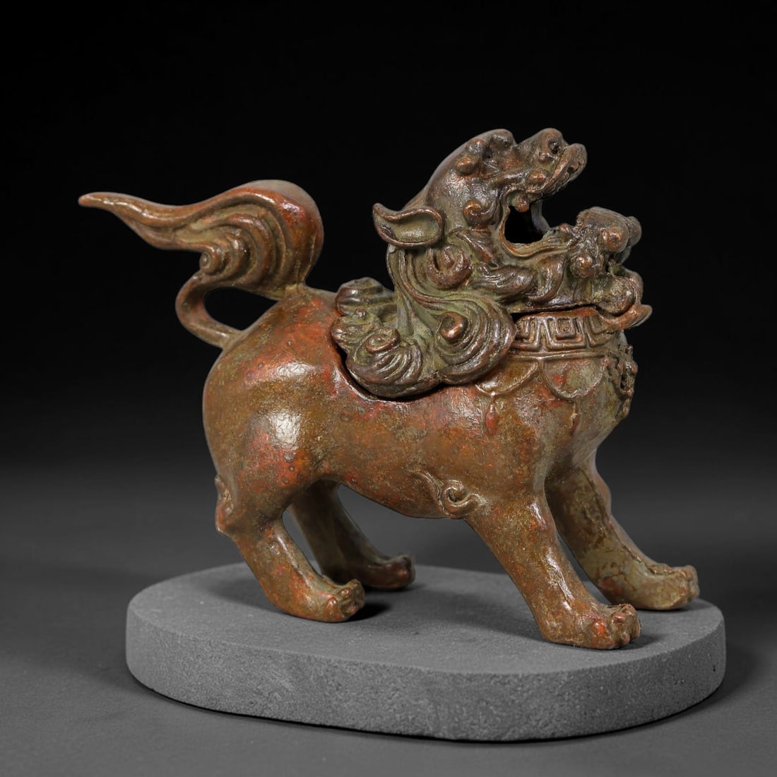 A Chinese Bronze Guardian Lion Form Lidded Censer, 16AD (1 of 3)