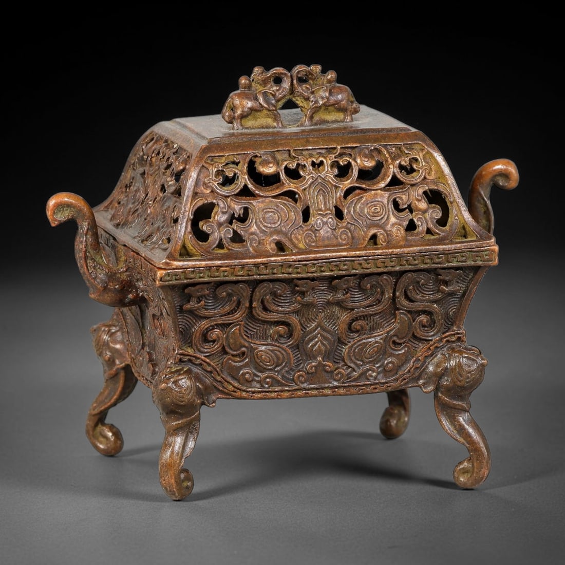A Chinese Bronze Rectangular Censer with Elephant-Form Finial and Legs, 91AD (1 of 3)