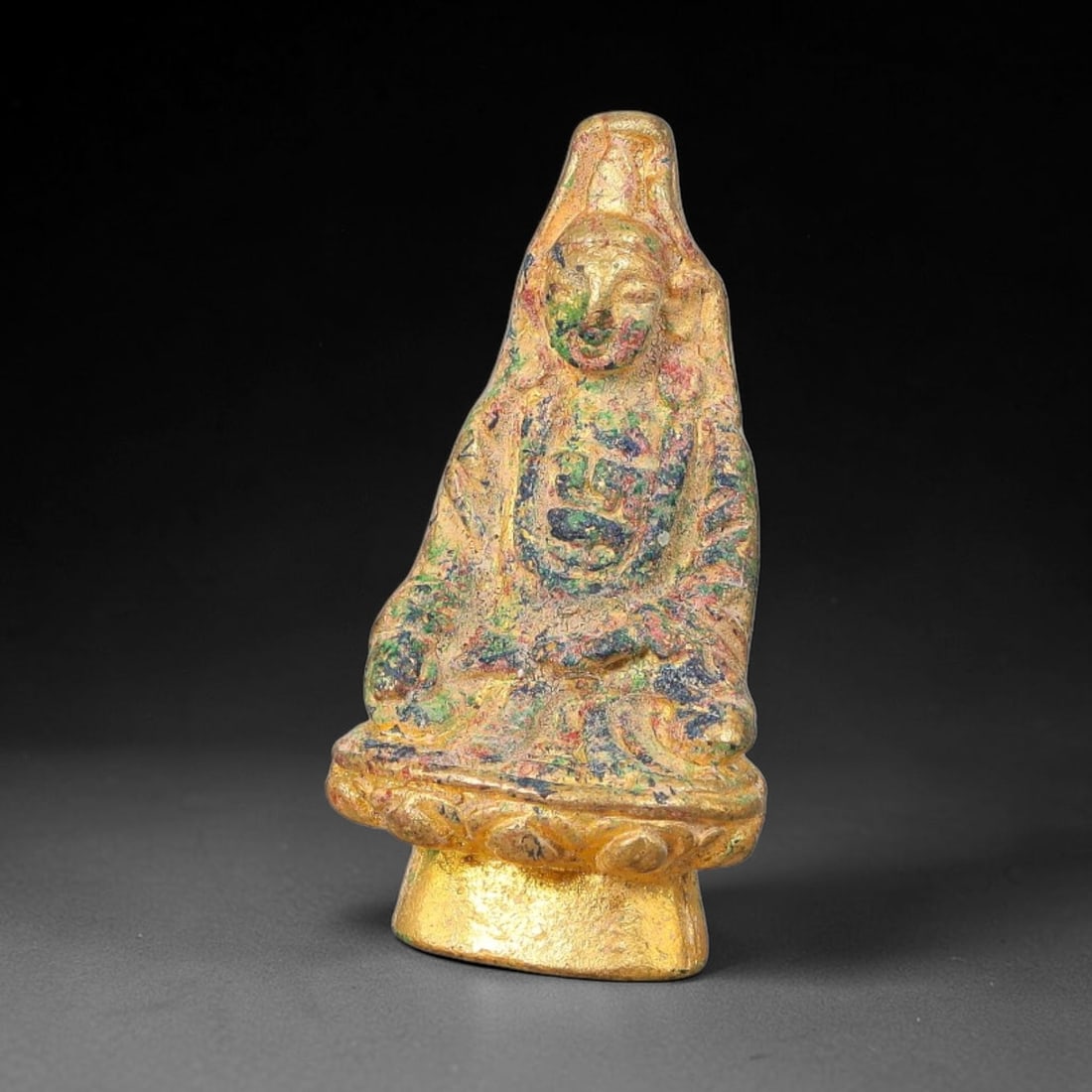 A Chinese Gilt Bronze Seated Bodhisattva Miniature Figurine, 47AD: Gilt bronze miniature bodhisattva figurine depicted seated in meditative pose upon a detailed lotus pedestal with integrated solid base. The figure wears flowing layered robes and stylized headdress, 