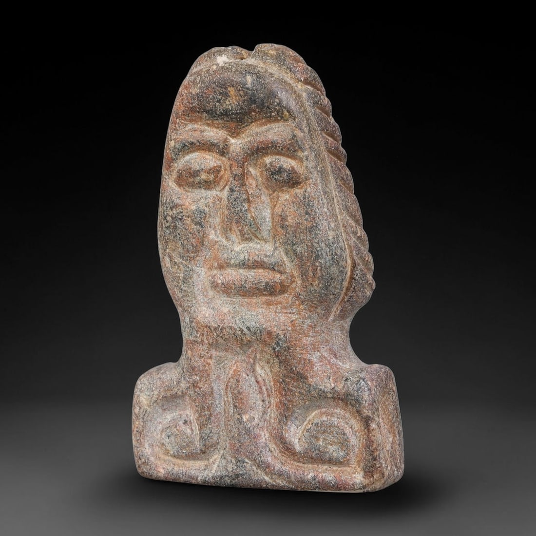 Ancient Sasanian Persian Stone Anthropomorphic Bust Amulet (224-651 CE), 90AJ: This ancient stone anthropomorphic bust amulet originates from the Sasanian Persian Empire, crafted as a protective personal talisman representative of late-antique West Iranian stone carving traditio