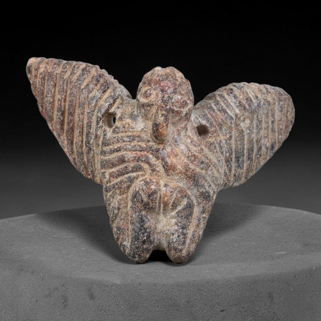 Ancient Sogdian Culture Winged Zoomorphic Stone Amulet (500 BCE-800 CE), 83AJ: This ancient winged zoomorphic stone amulet originates from Sogdian Culture, produced by Silk Road merchant-artisans for apotropaic personal wear and long-distance trade. The figurine features fully s