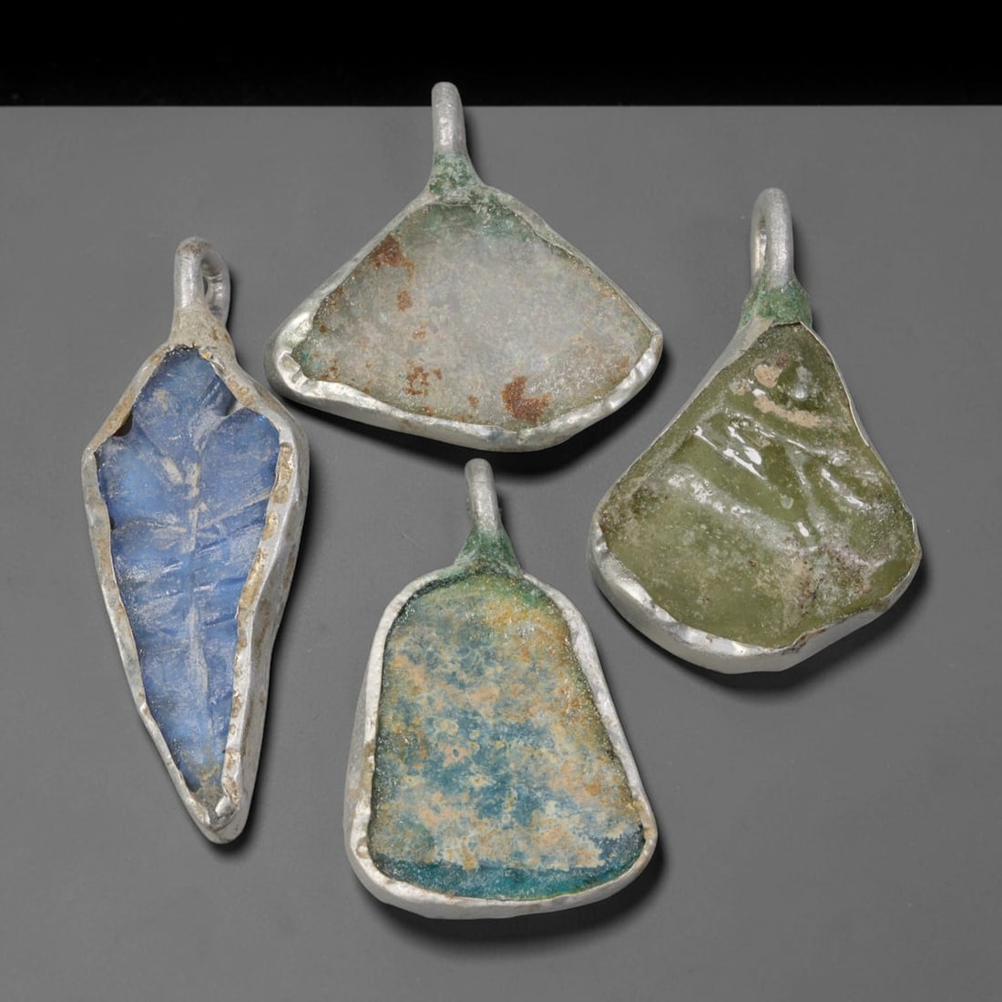 Ancient Roman Glass Silver-Mounted Pendants (509 BCE-476 CE), 93AK (1 of 2)