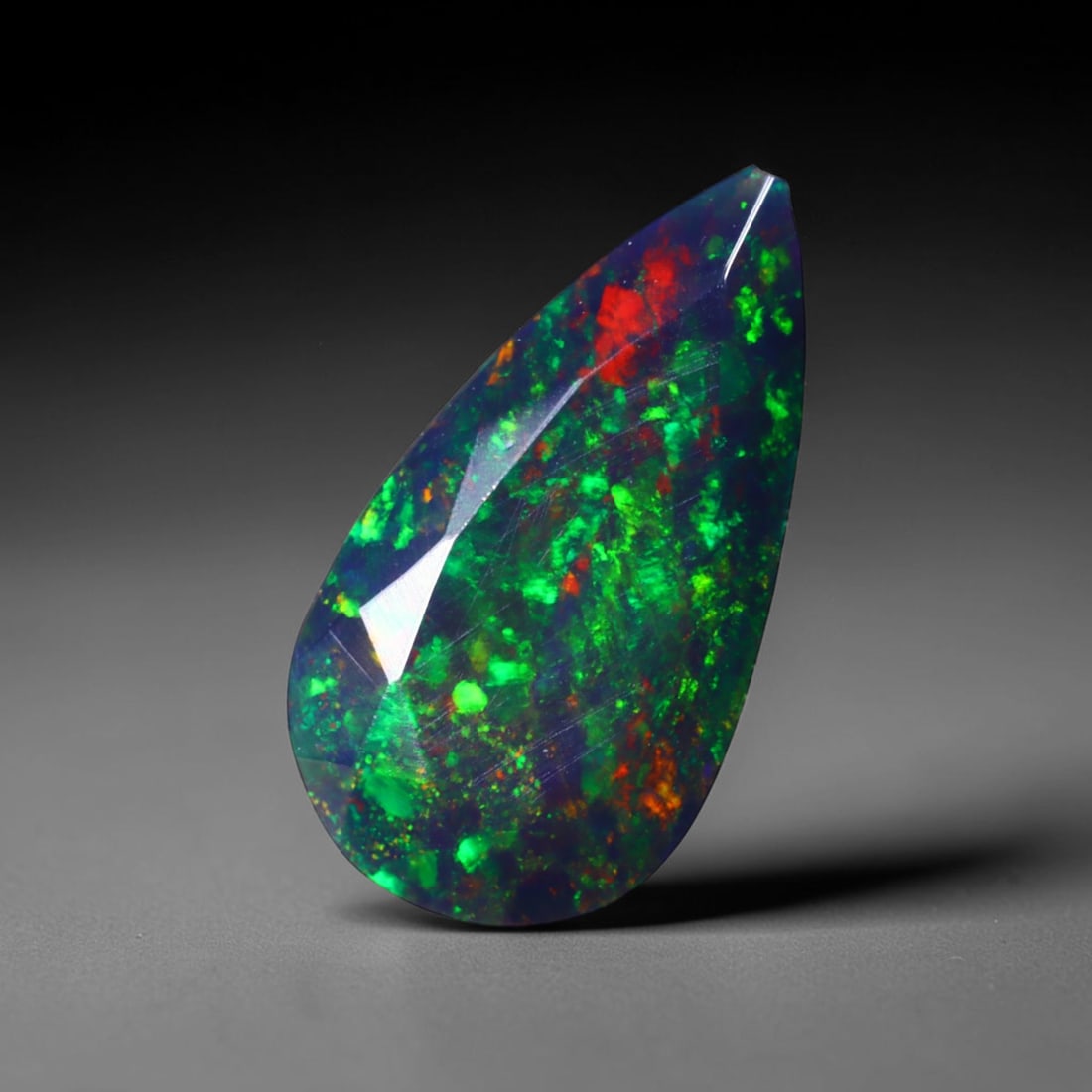 1.57 Ct Black Opal Faceted Cut Polished - Ethiopian Opal - 14x7mm , 922C: No Reserve Gems Auction Subject: Natural Ethiopian Welo Black Opal Origin: Ethiopia Treatment: Smoked