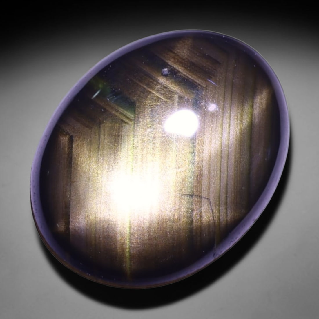 1.98cts 6 Rays Black Star Sapphire , 550E: No Reserve Gems Auction Subject: Natural 6 Rays Star Sapphire Origin: Myanmar Carat Weight: 1.98 cts Dimension: 9.8x7.7x1.8 mm Treatment: Diffusion Type: Cabochon, Polishe