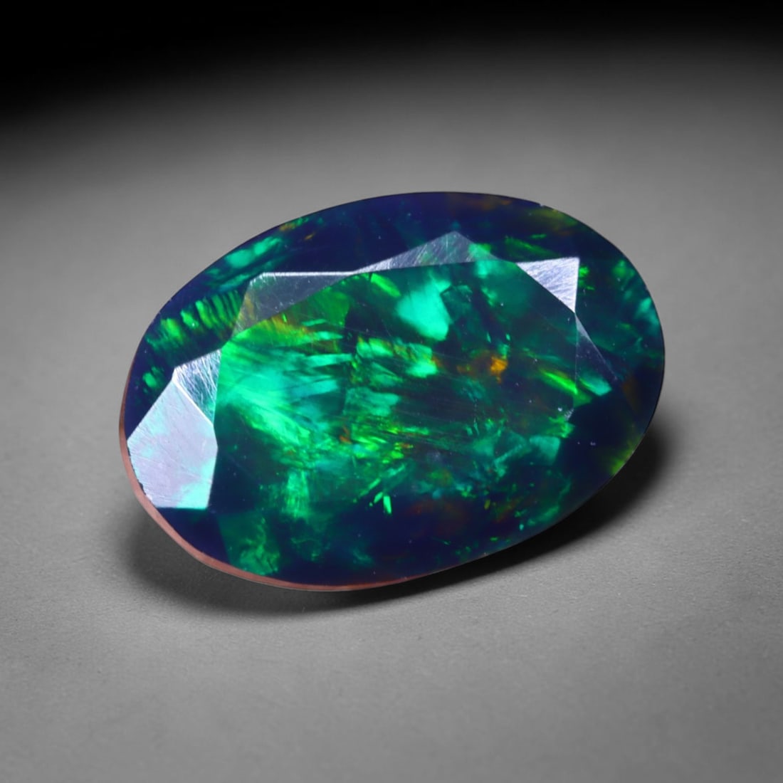 1.79 Ct Black Opal Faceted Cut Polished - Ethiopian Opal - 10x7mm , 920C: No Reserve Gems Auction Subject: Natural Ethiopian Welo Black Opal Origin: Ethiopia Treatment: Smoked