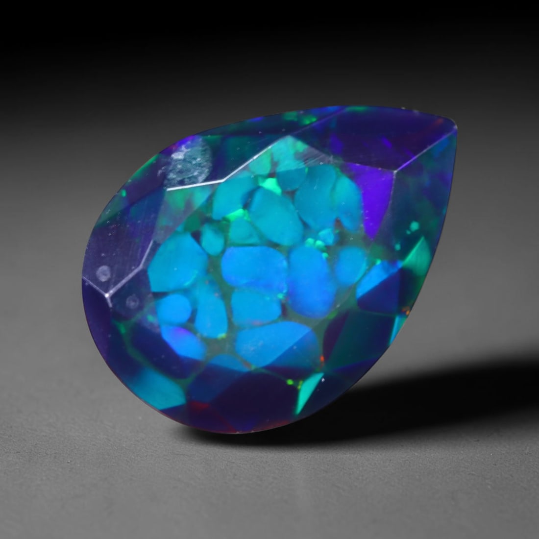 1.38 Ct Black Opal Faceted Cut Polished - Ethiopian Opal - 10x7mm , 956C: No Reserve Gems Auction Subject: Natural Ethiopian Welo Black Opal Origin: Ethiopia Treatment: Smoked