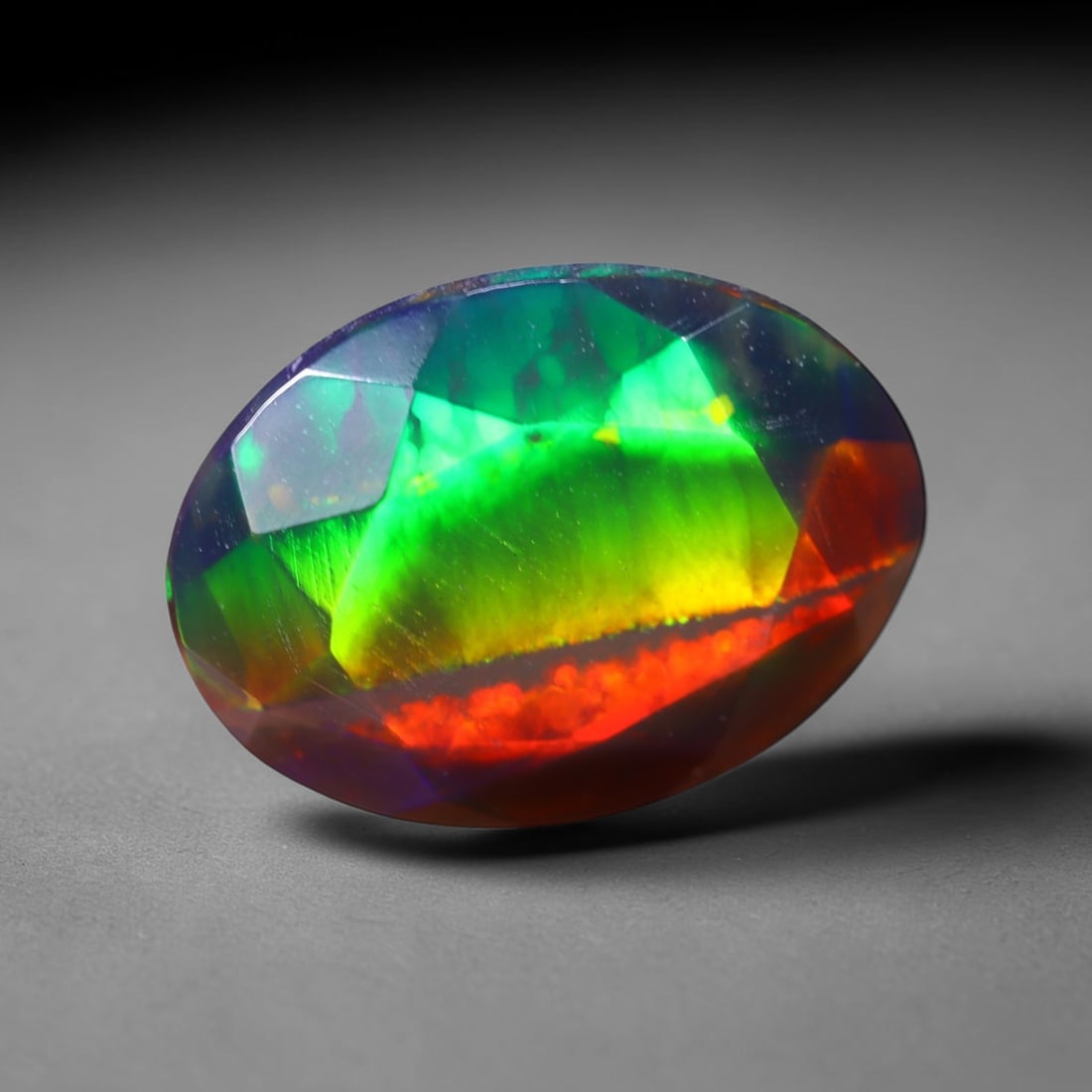 1.27 Ct Black Opal Faceted Cut Polished - Ethiopian Opal - 10x7mm , 948C: No Reserve Gems Auction Subject: Natural Ethiopian Welo Black Opal Origin: Ethiopia Treatment: Smoked