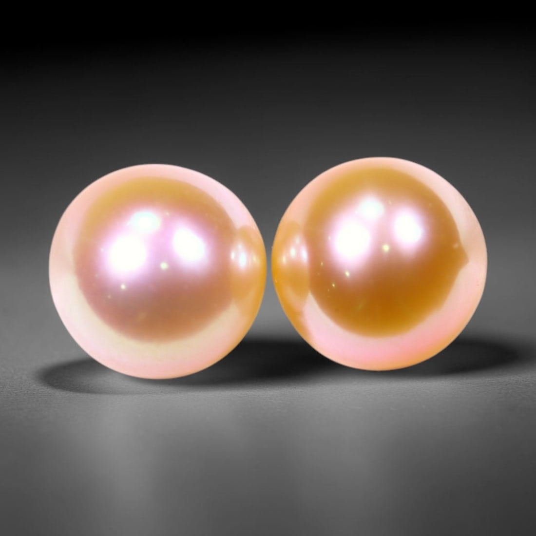 2.38cts Freshwater Pearl Pair 5.5mm, Peach Natural Colour - No Hole Drill , 504C: No Reserve Gems Auction Subject: Natural Pearl Treatment: None, Natural Colour Shape: Round Bead Type: Without hole, no drill