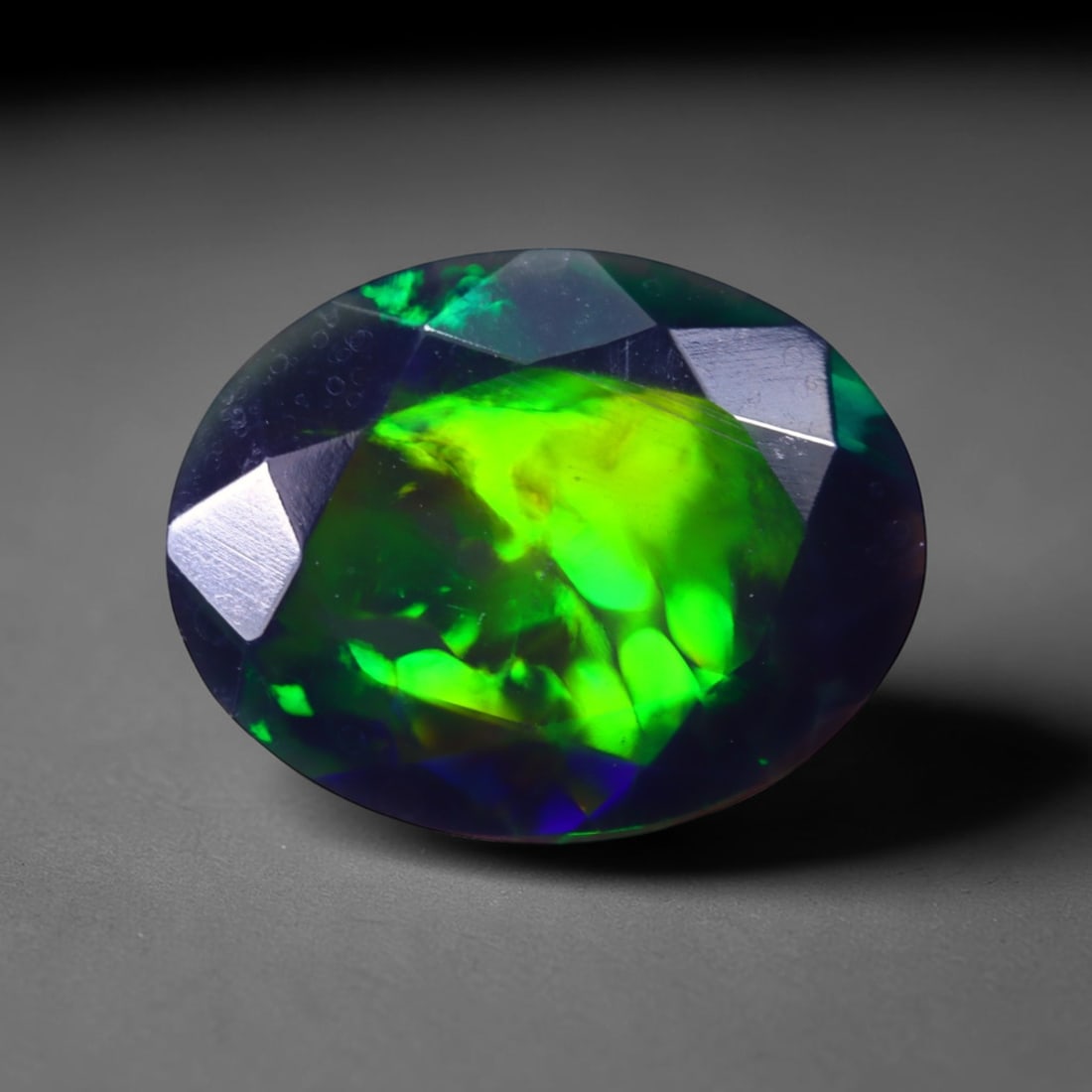1.25 Ct Black Opal Faceted Cut Polished - Ethiopian Opal - 9x7mm , 925C: No Reserve Gems Auction Subject: Natural Ethiopian Welo Black Opal Origin: Ethiopia Treatment: Smoked